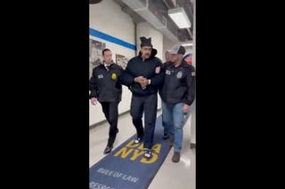A still image from video posted by the White House's Rapid Response 47 account on X.com, shows Venezuela's President Nicolas Maduro being walked in custody down a hallway at the offices of the U.S. Drug Enforcement Administration in New York City, 3 January 2026